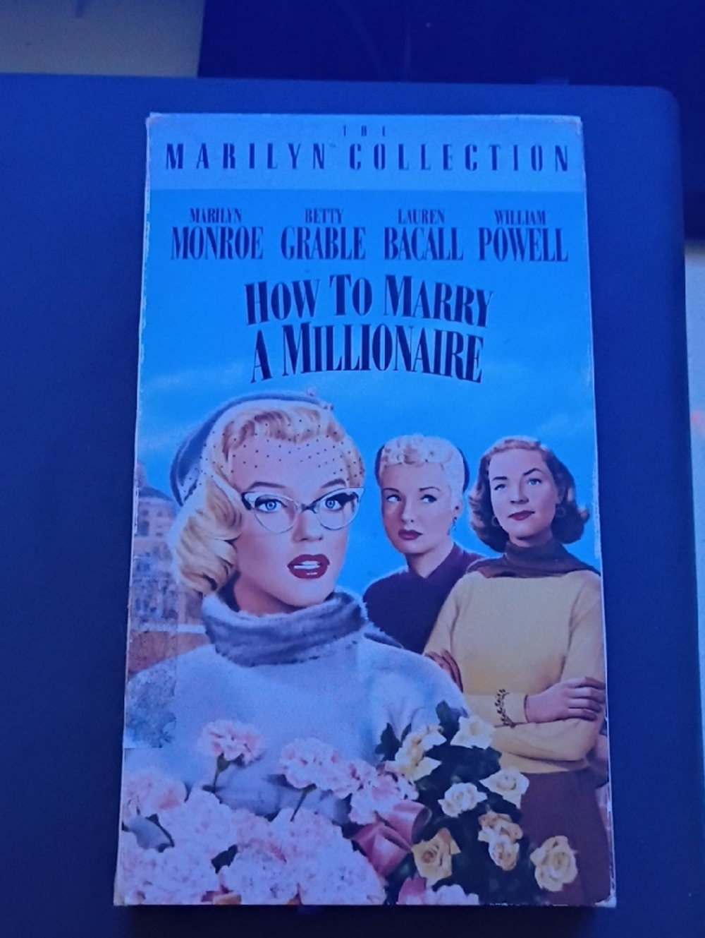Marilyn Monroe VHS Movie Cover with Pastel Flowers